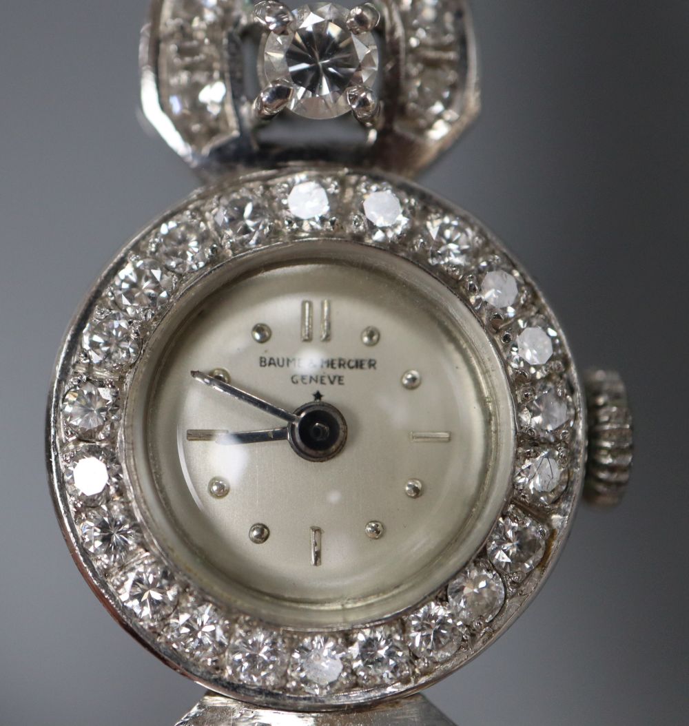 A ladys mid 20th century 585 white metal and diamond set Baume & Mercier manual wind cocktail watch, approx. 18.5cm.